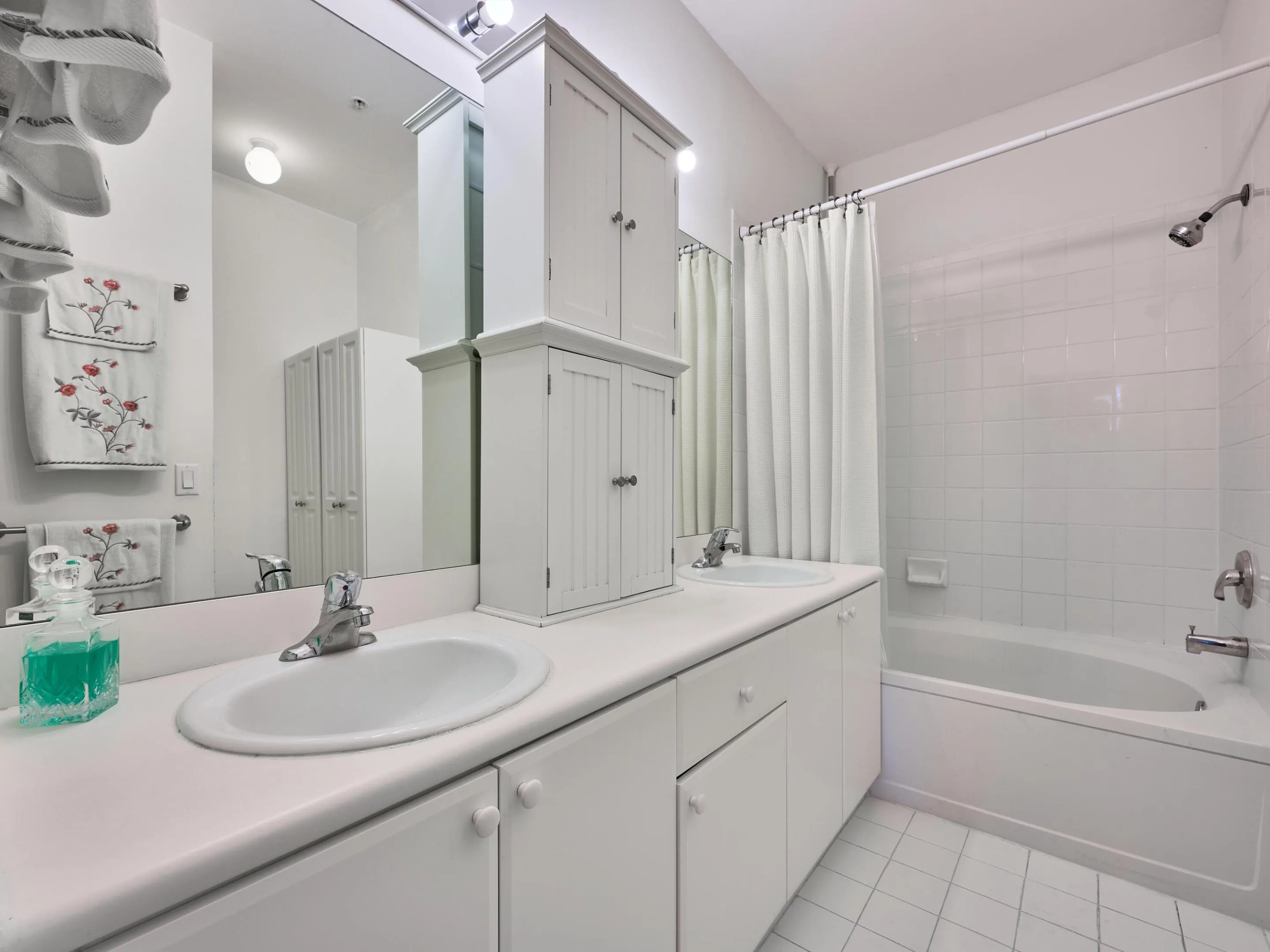 Master Bathroom, double vanity sinks, tub and shower combo