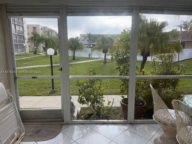 Sliding glass doors and screened in area