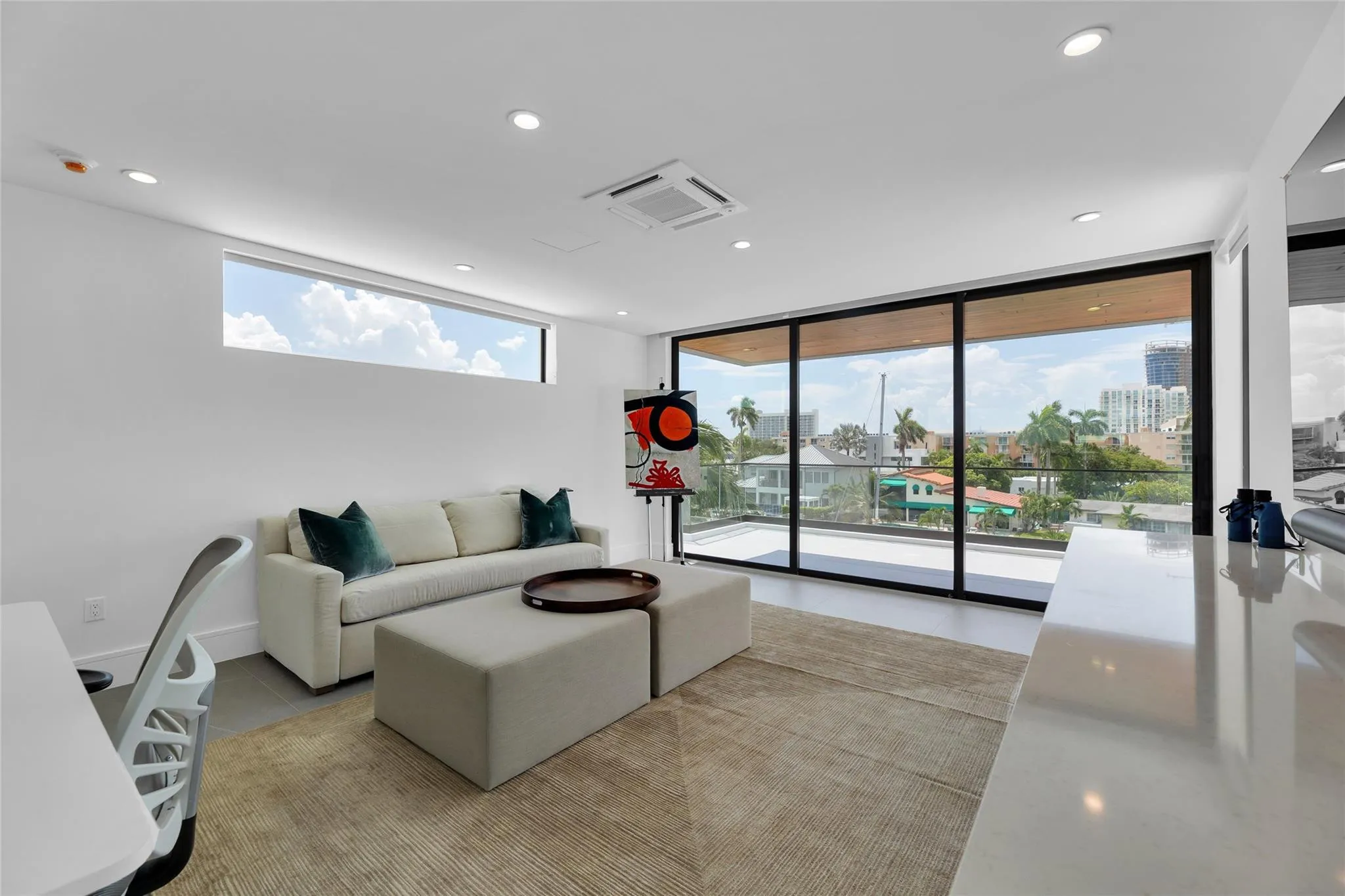 3rd Floor Den w/ Kitchenette & expansive balcony.