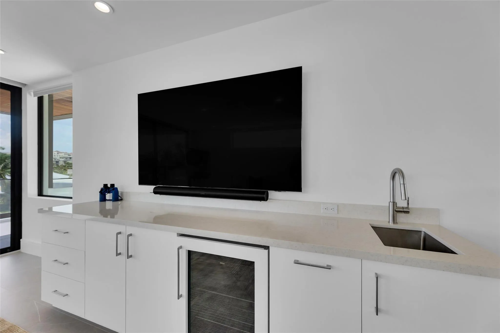 3rd Floor Den w/ Kitchenette & expansive balcony.