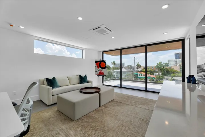 3rd Floor Den w/ Kitchenette & expansive balcony.