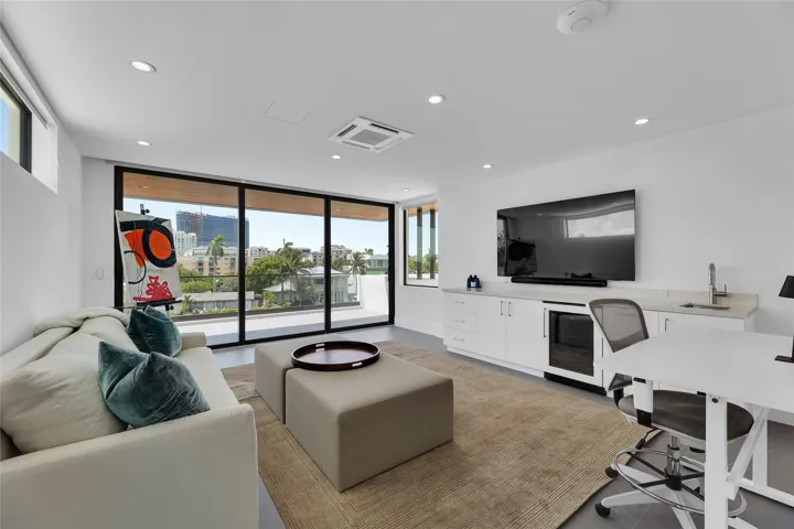 3rd Floor Den w/ Kitchenette & expansive balcony.
