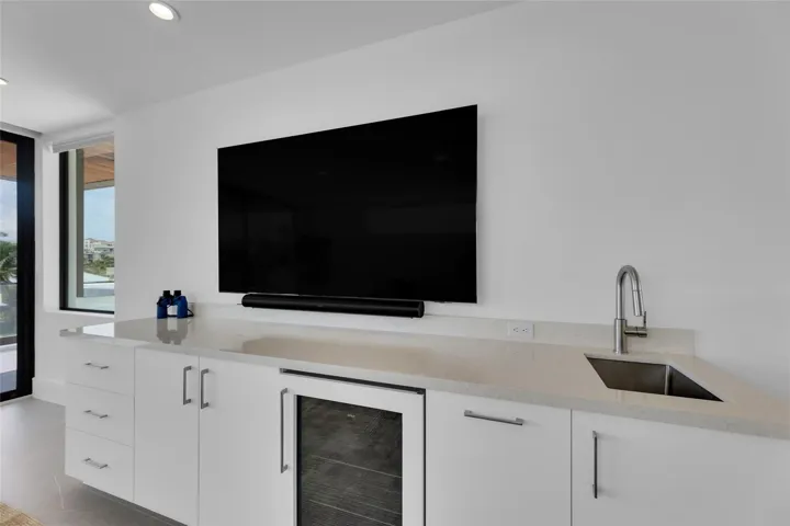 3rd Floor Den w/ Kitchenette & expansive balcony.