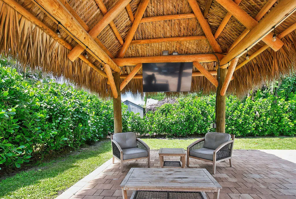 Covered tiki hut with flat screen TV