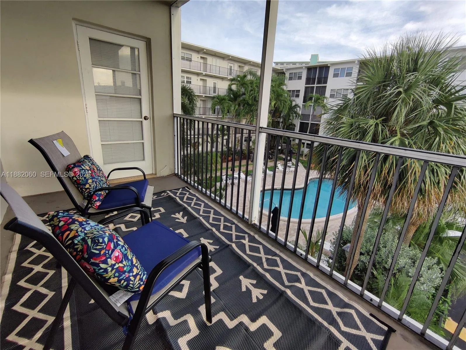 Balcony overlooking pool