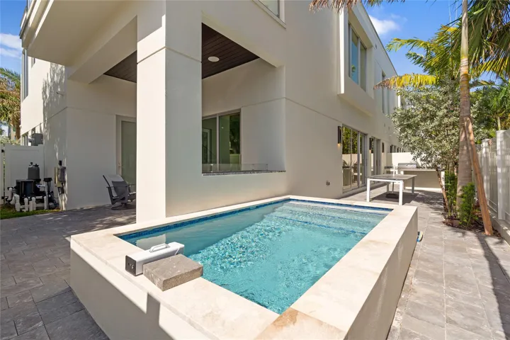 A remarkable luxury townhome rental that redefines upscale living in the heart of Lauderdale By The Sea. This beautifully designed 3,027 sq. ft residence features 4 spacious beds & 4.5 baths, making it perfect for families or those who love to entertain.The home also offers an outdoor kitchen and BBQ area, along with a private plunge pool that invites relaxation and fun. For boating enthusiasts, a boat slip is also available for rent. Easy access to a plethora of amenities, beach, dining, & entertainment.
