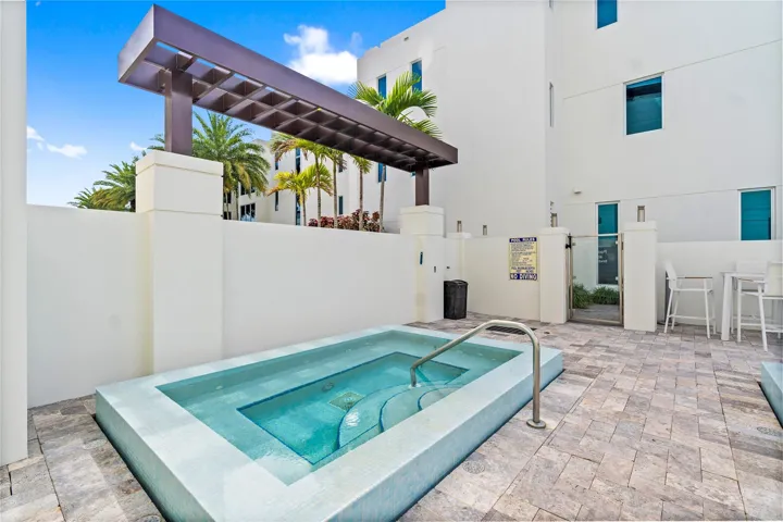 A remarkable luxury townhome rental that redefines upscale living in the heart of Lauderdale By The Sea. This beautifully designed 3,027 sq. ft residence features 4 spacious beds & 4.5 baths, making it perfect for families or those who love to entertain.The home also offers an outdoor kitchen and BBQ area, along with a private plunge pool that invites relaxation and fun. For boating enthusiasts, a boat slip is also available for rent. Easy access to a plethora of amenities, beach, dining, & entertainment.