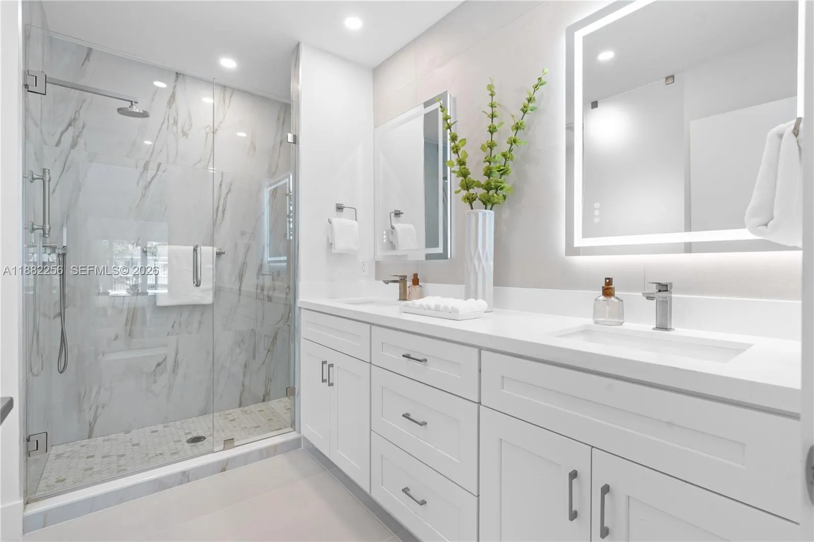 Double sink and shower in primary bathroom