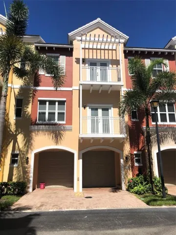 3 levels, 2 balconies, 2 car garage, 2 driveway spaces