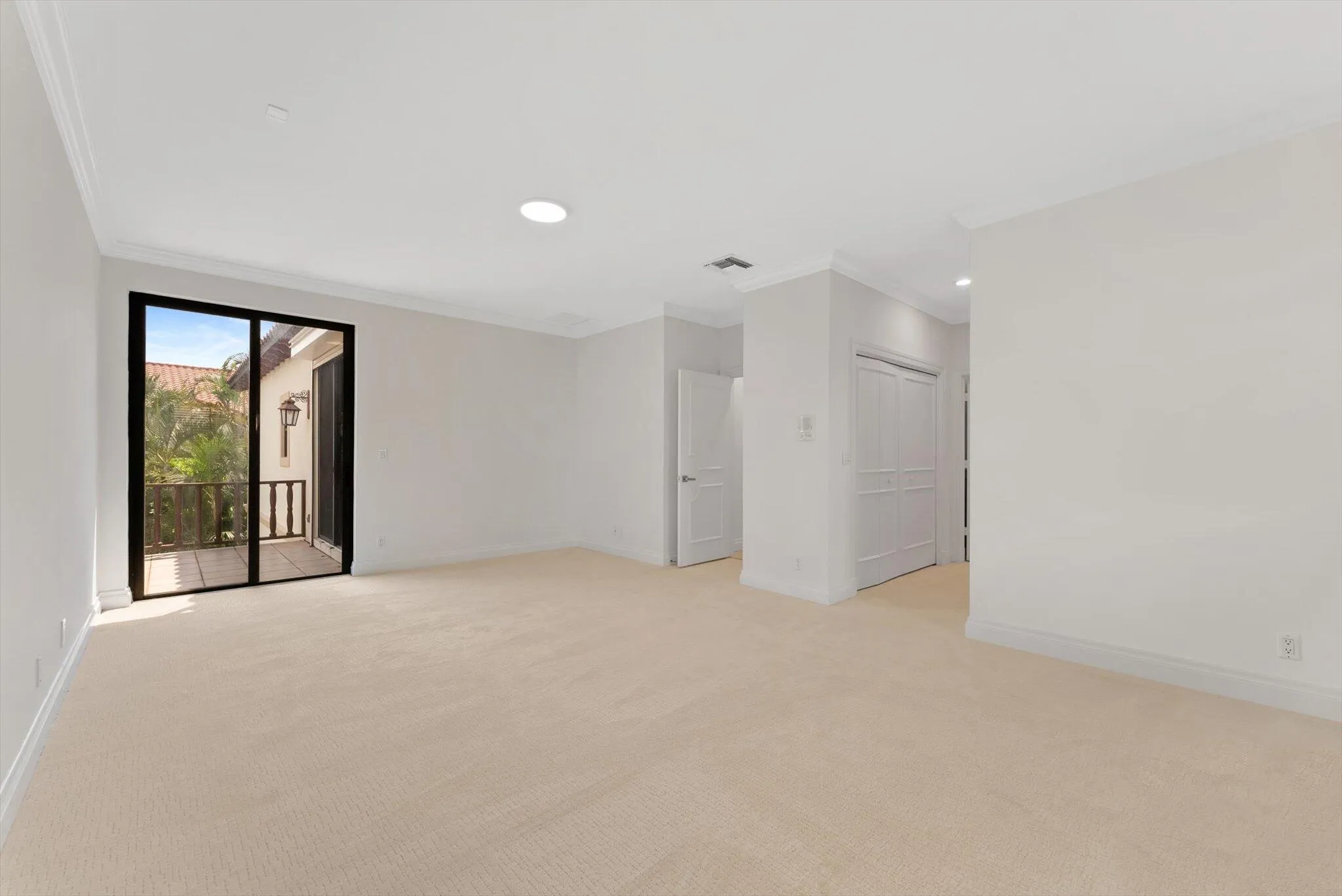 Second Bedroom with En-Suite Bathroom, Terrace access, and Dual Walk-in Closets.