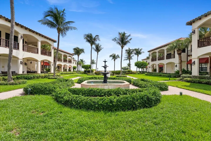 Mediterranean Courtyard leading to pool, spa, bar, and private deeded beach access...