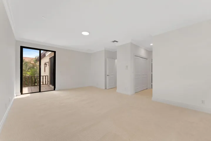Second Bedroom with En-Suite Bathroom, Terrace access, and Dual Walk-in Closets.