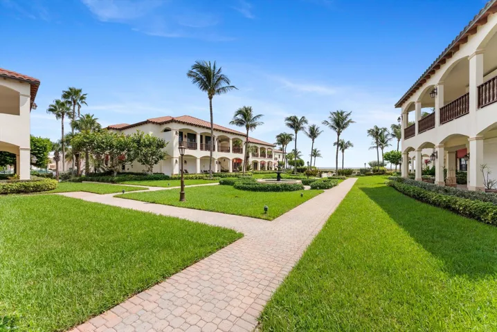 Mediterranean Courtyard leading to pool, spa, bar, and private deeded beach access...
