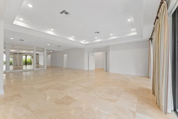 Enormous Living Area - Living and Formal Dining Area; Marble Flooring; Sophisticated.