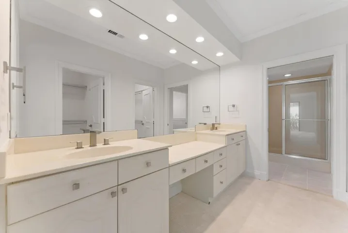 Primary Bathroom with Double Vanities and Makeup Area