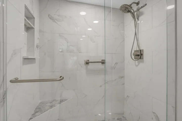 Primary shower with glass enclosure