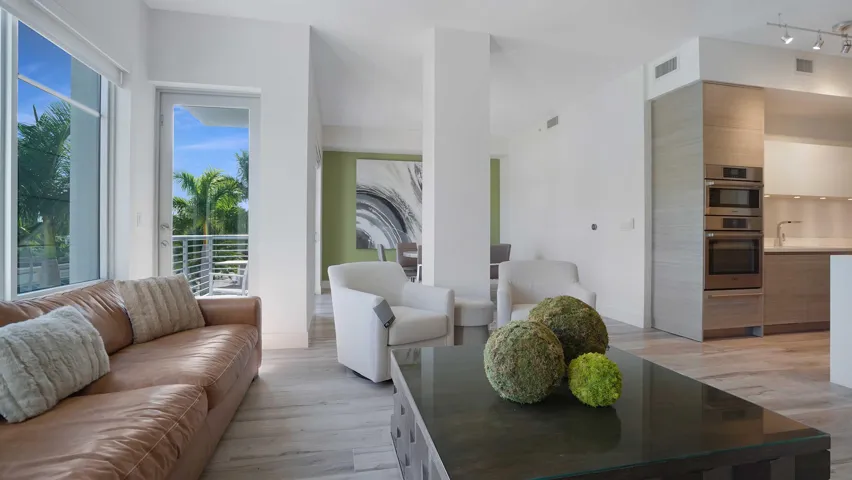 Open living area overlooking the resort-style pool