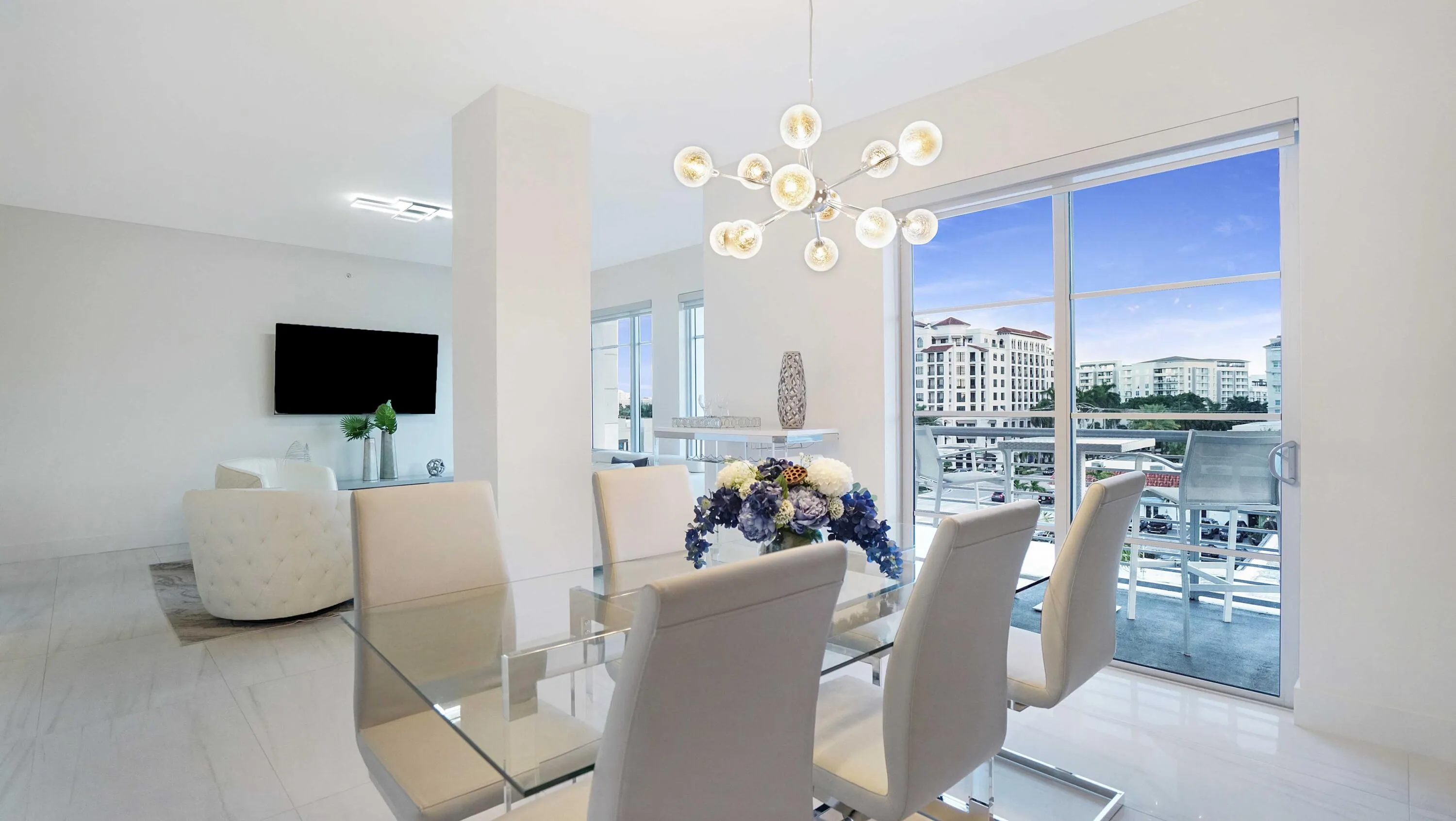 Private terrace overlooking the landscaped courtyard, extending the indoor-outdoor lifestyle just steps from Mizner Park, fine dining, shopping, and Boca Raton's cultural district.