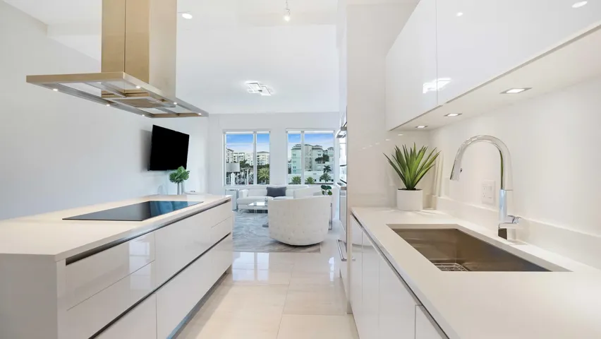 Open-concept kitchen at Tower 155 in Downtown Boca Raton, thoughtfully designed for everyday living and effortless entertaining just moments from Mizner Park.