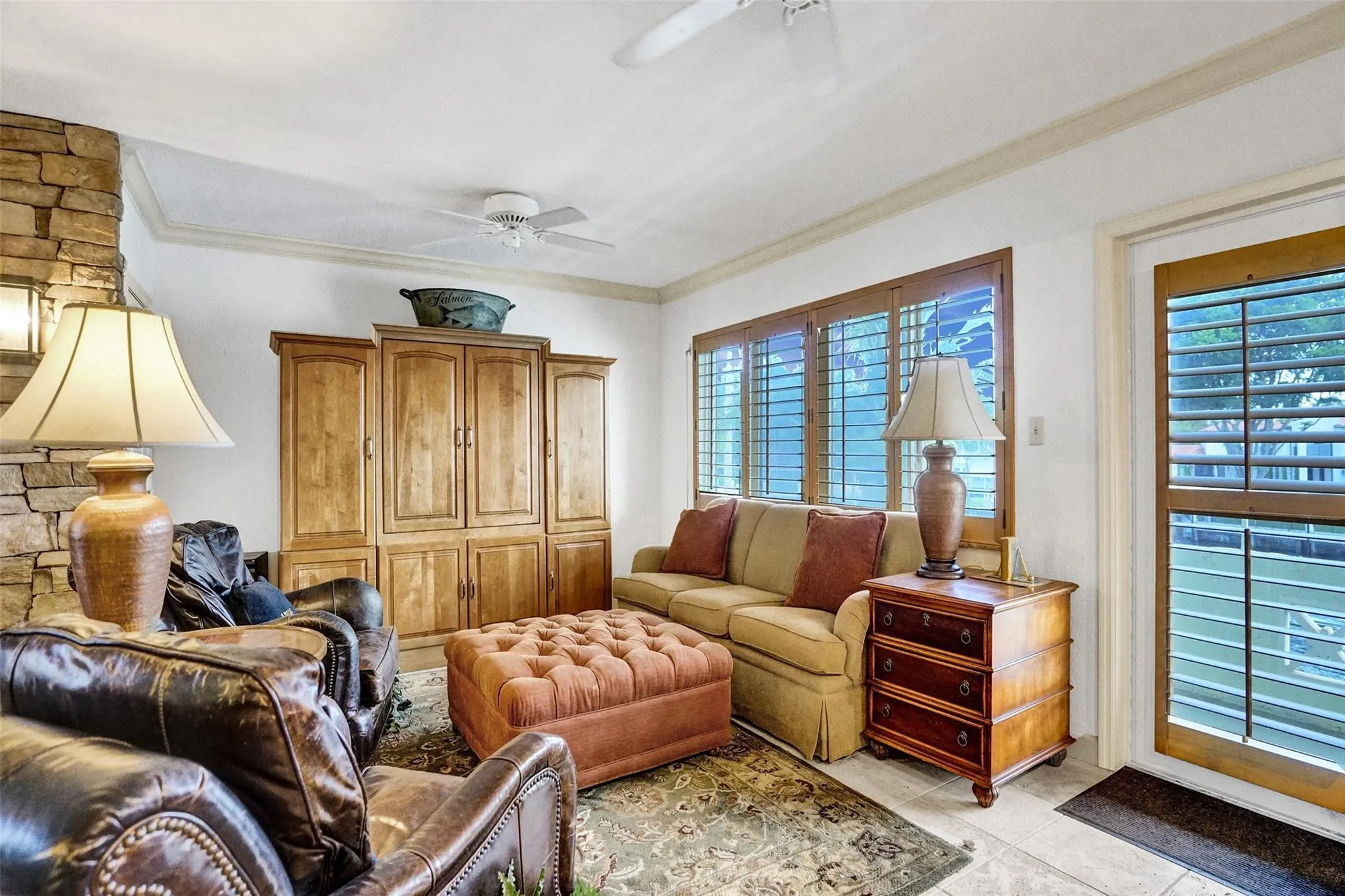 Living room with a wall of windows facing the iconic New River