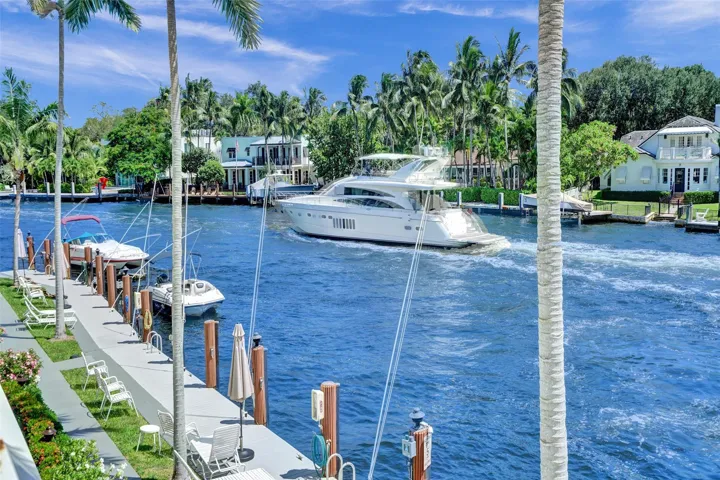 A parade of yachts passing by your windows everyday!
