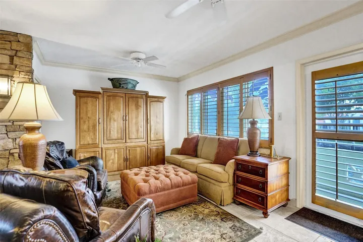 Living room with a wall of windows facing the iconic New River