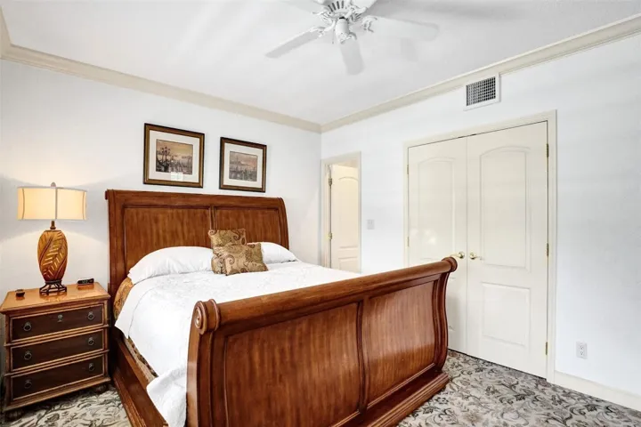 Primary bedroom with views of the river.