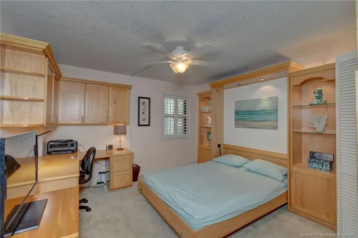Guest With Queen pull down bed (flooring is solid surface)