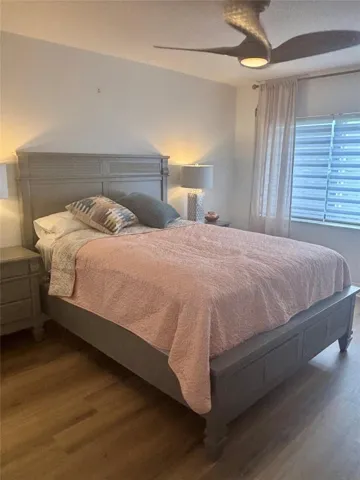Primary Bedroom with Solid flooring