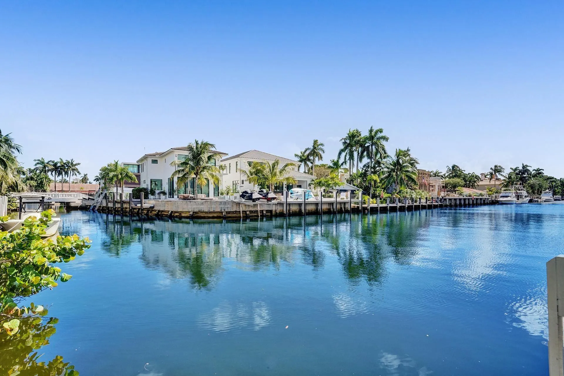 FROM THE POOL-SIDE, ENJOY THE MULTI-MILLION- DOLLAR MANSIONS SURROUNDING YOU.
