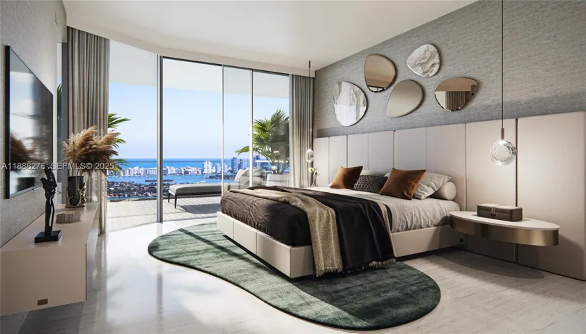 primary bedroom with direct water view