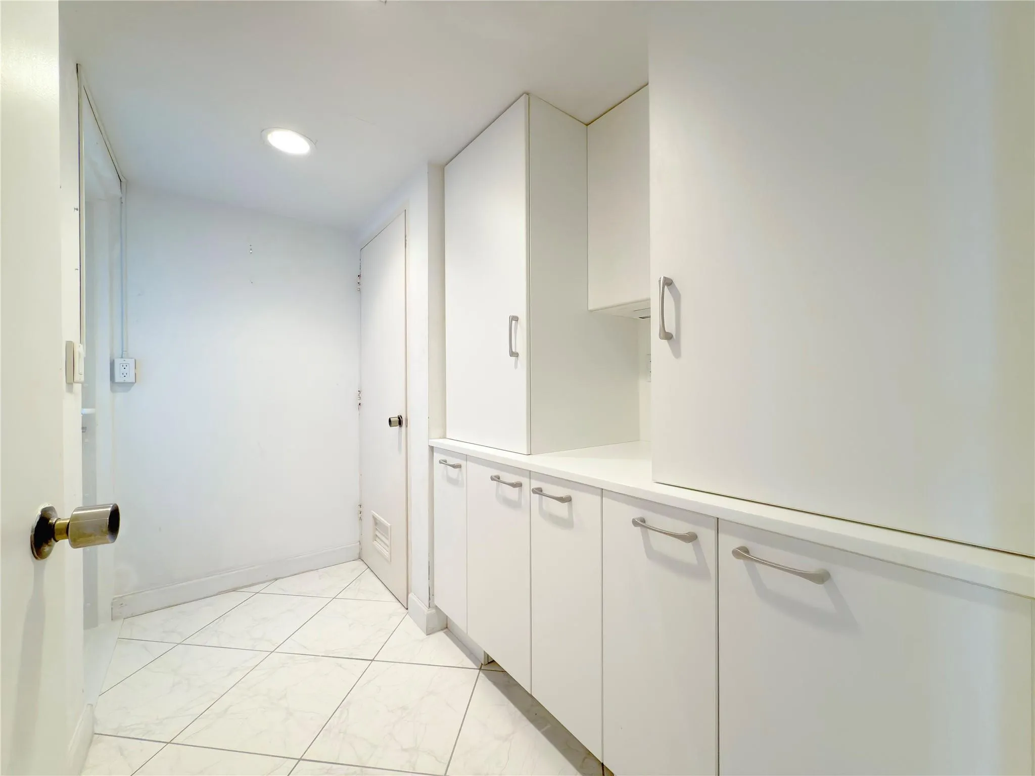 Separate Laundry Room w/plenty of space for full size machines.