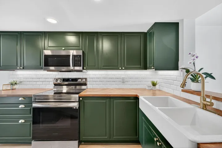 Beautifully updated kitchen with gorgeous cabinets, counters and newer stainless appliances.