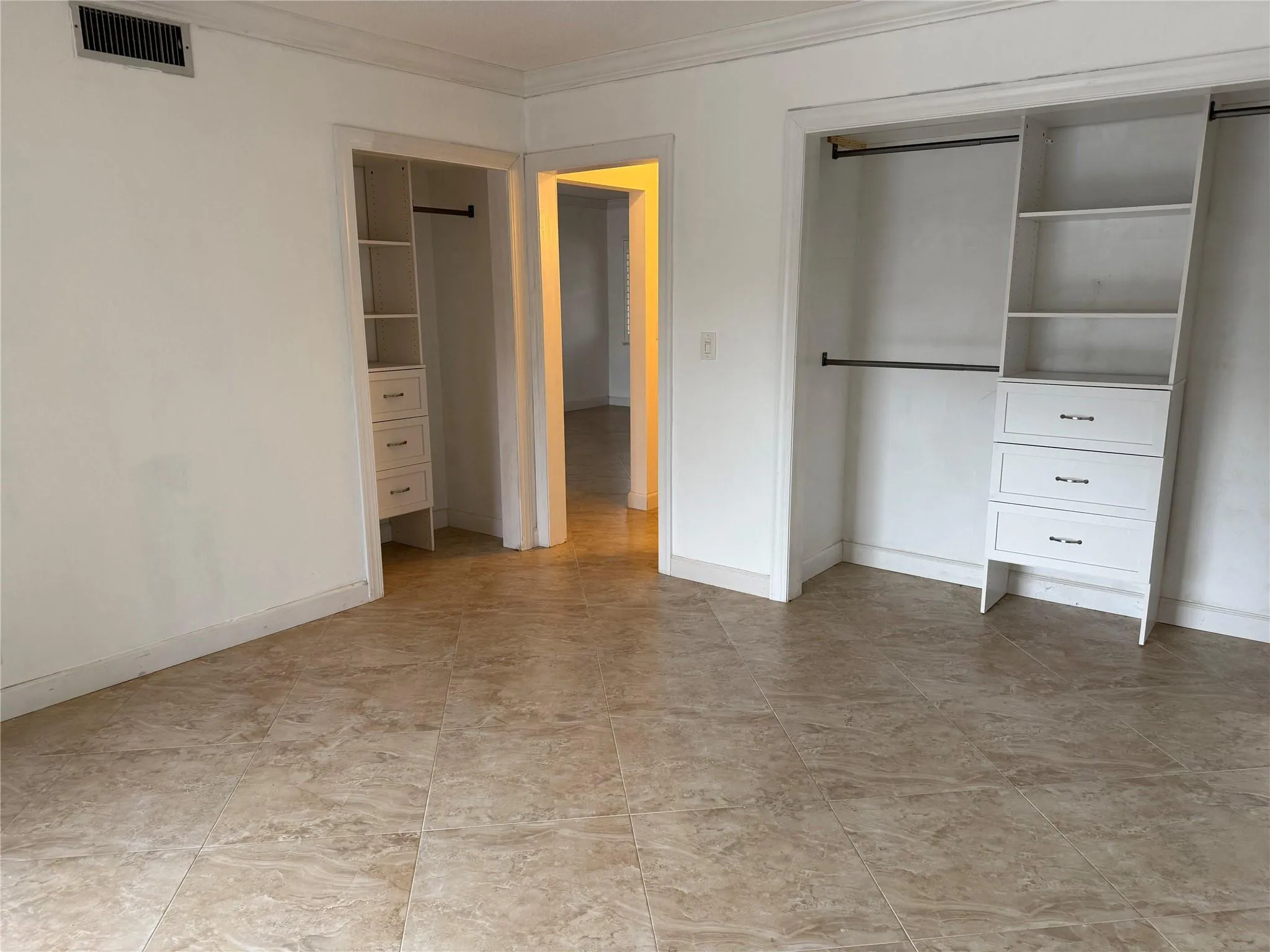 Tile floors and 2 closets with built ins
