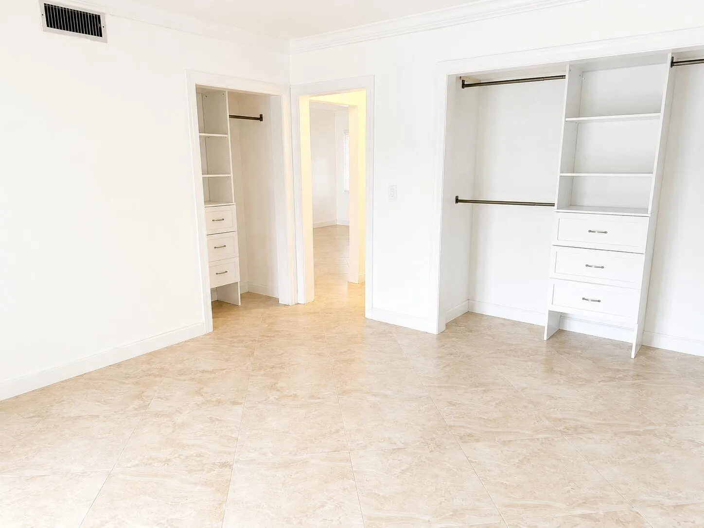 Tile floors and 2 closets with built ins