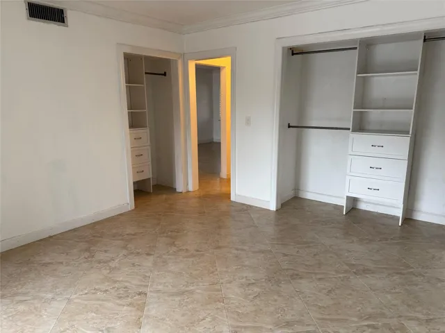 Tile floors and 2 closets with built ins