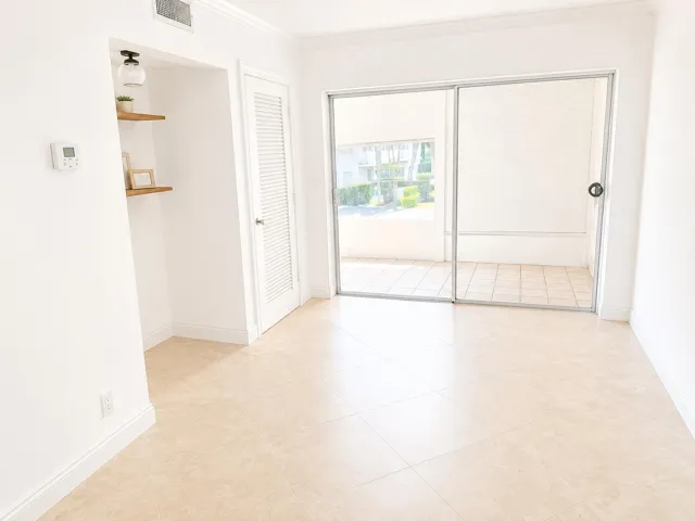 large living area leads out to patio- this could be 2nd bedroom