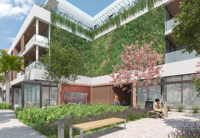 CALMING WATER FEATURE & LUSH BOTANNICAL WALL GARDEN COMPLETE WITH BEAUTIFUL LANDSCAPING AROUND THE BUILDING