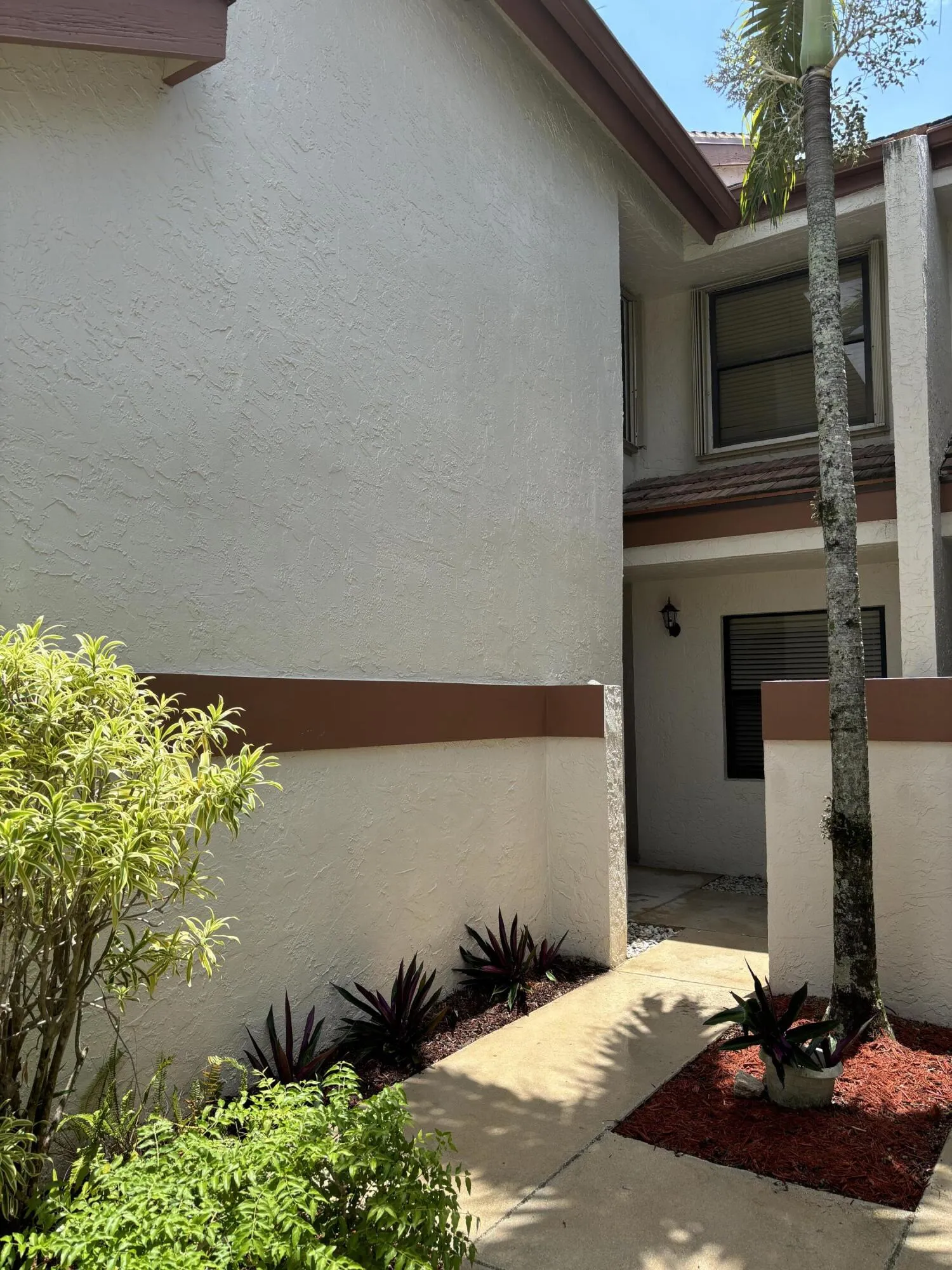 Entrance with private gate and small garden