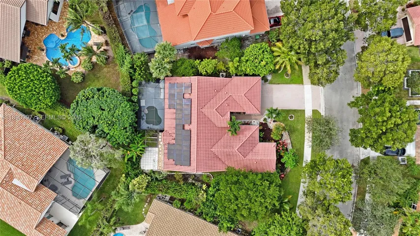 Aerial view highlighting generous backyard size and outdoor potential