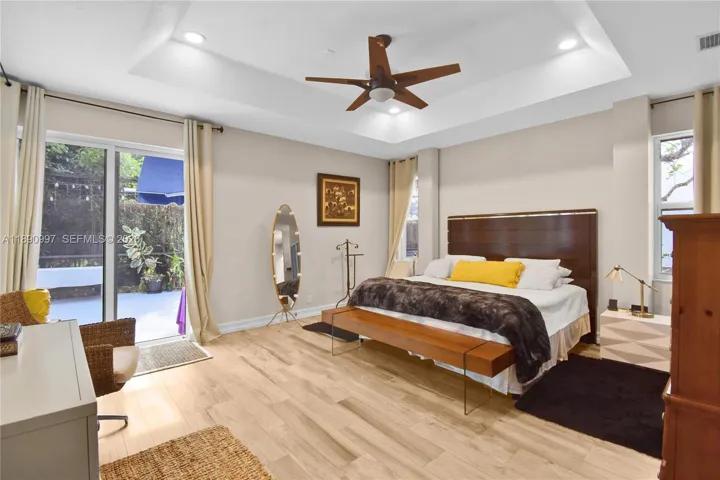 Expansive primary bedroom with generous layout and natural light