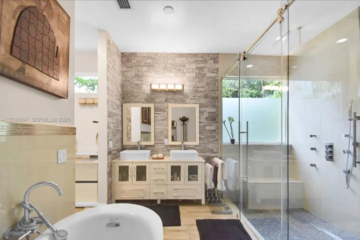 Fully updated primary bathroom with modern finishes