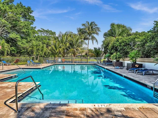 Heated community pool overlooking the lake