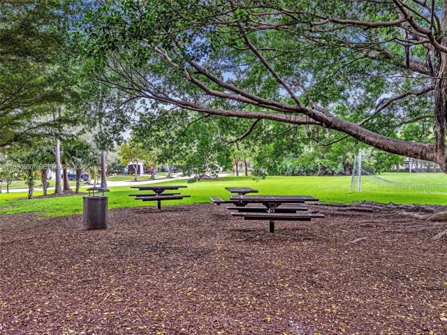 Expansive green space with soccer field, ideal for recreation and events