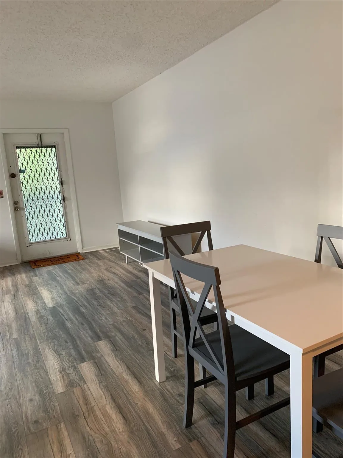 Dining area showing New laminated flooring .