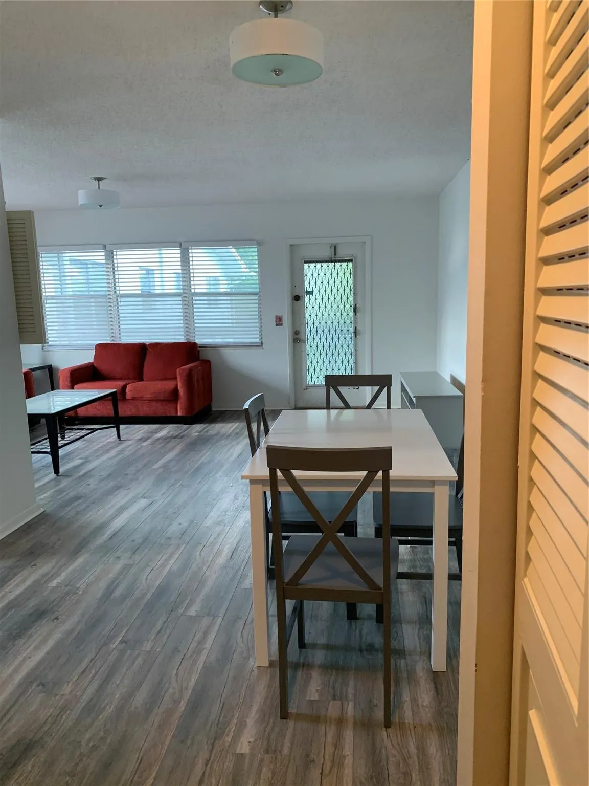 Living and Dining Areas. with all Brand New Window Blinds.