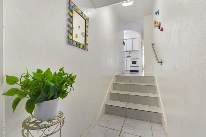 Inside Entry has 4 stairs into the unit