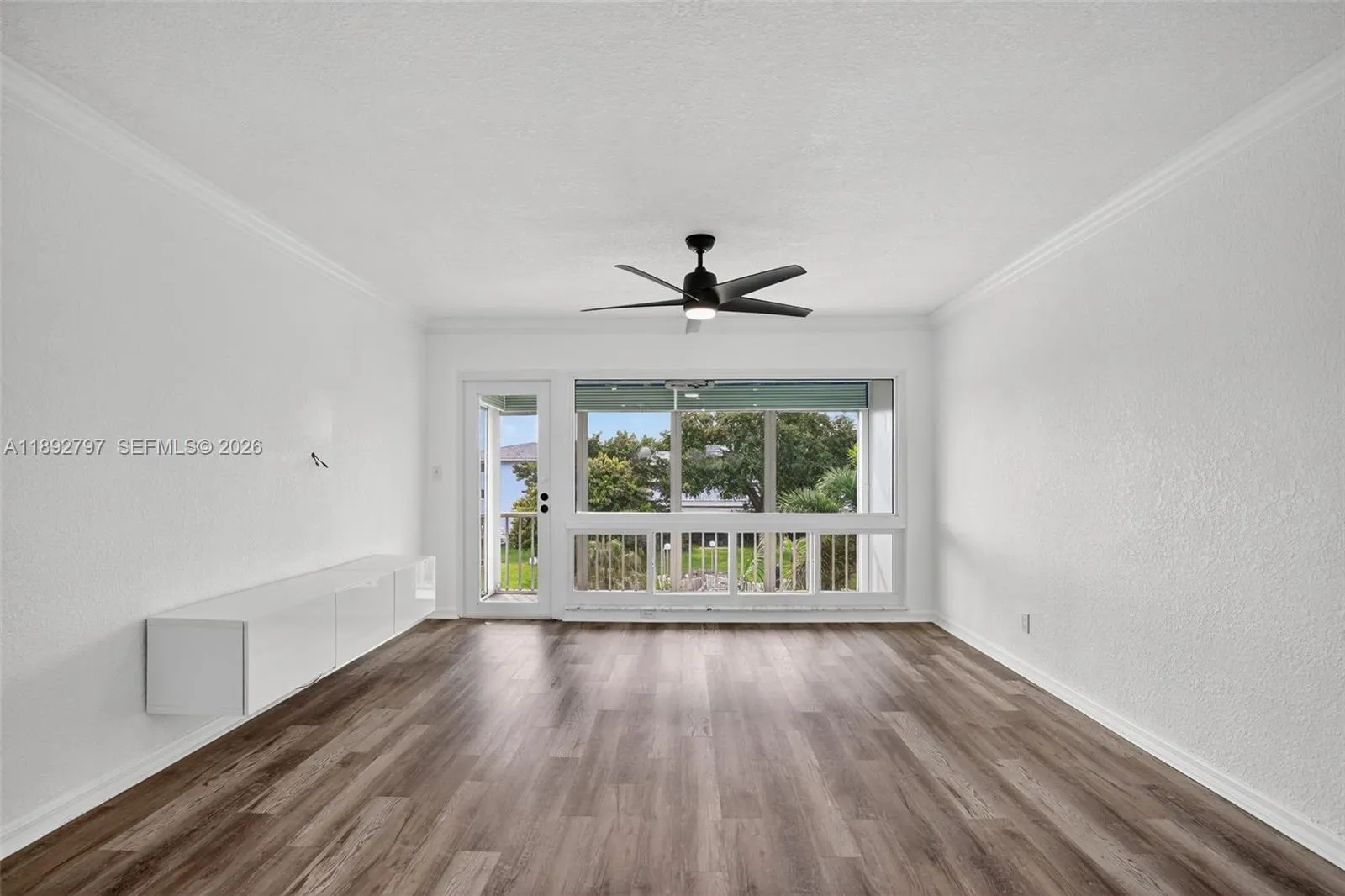 Flat Ceilings with high hat lighting. Garden & Water Views. Updated flooring and paint, Impact Windows
