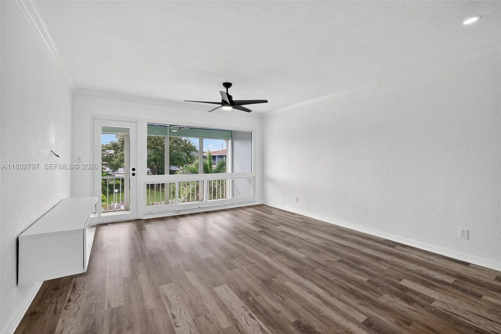 Flat Ceilings with high hat lighting. Garden & Water Views. Updated flooring and paint, Impact Windows