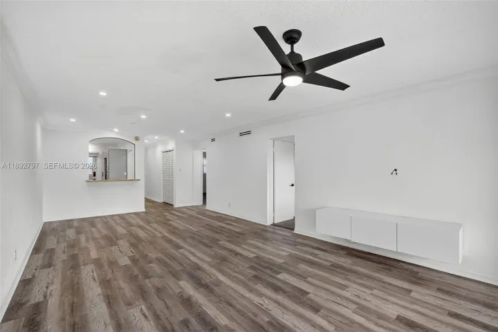 Flat Ceilings with high hat lighting. Updated flooring and paint, Impact Windows